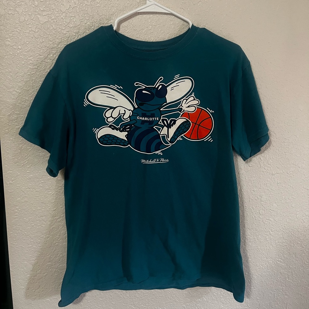 Mitchell and Ness charlotte hornets shirt.